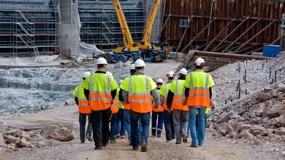 Construction workers walking