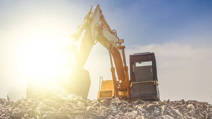 material handler moves garbage