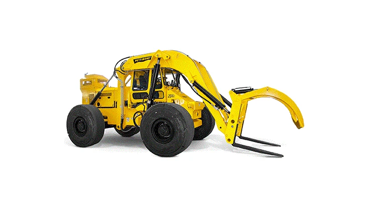 Pettibone Cary-Lift 204i rough terrain forklift with a scrap baler attachment