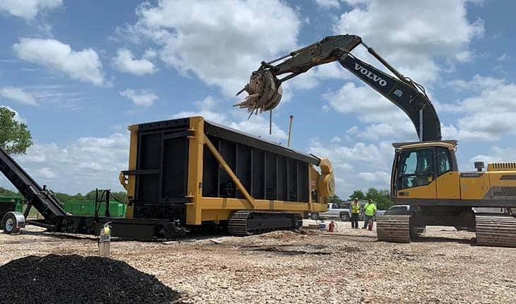 Material handler moves biochar