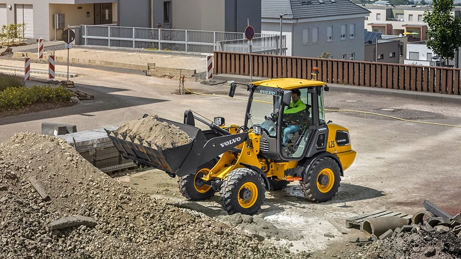 volvo electric wheel loader movign crushed concrete