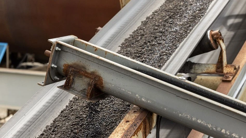 Pelletized ink toner on a conveyor belt