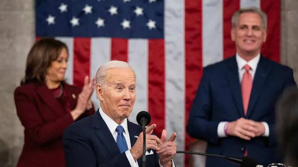 President Joe Biden is flanked by Vice President Kamala Harris and Speaker of the House Kevin McCarthy during the State of the Union address.