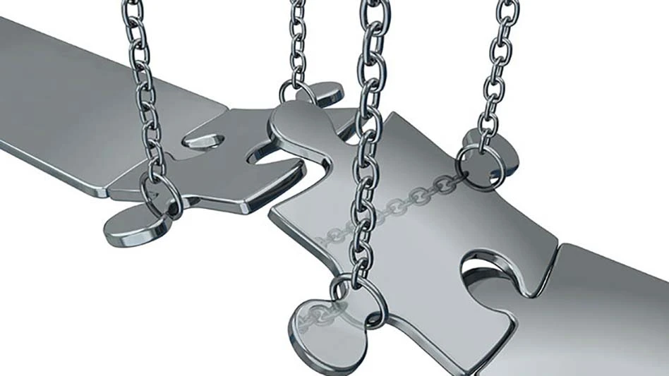 Metal drawbridge linked by jigsaw puzzle pieces