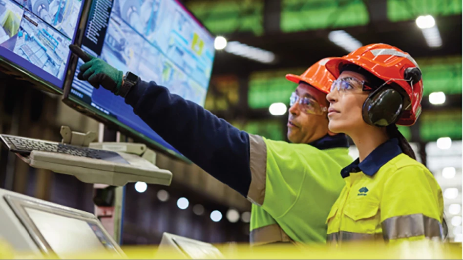 personnel review computer screens in a steel plant